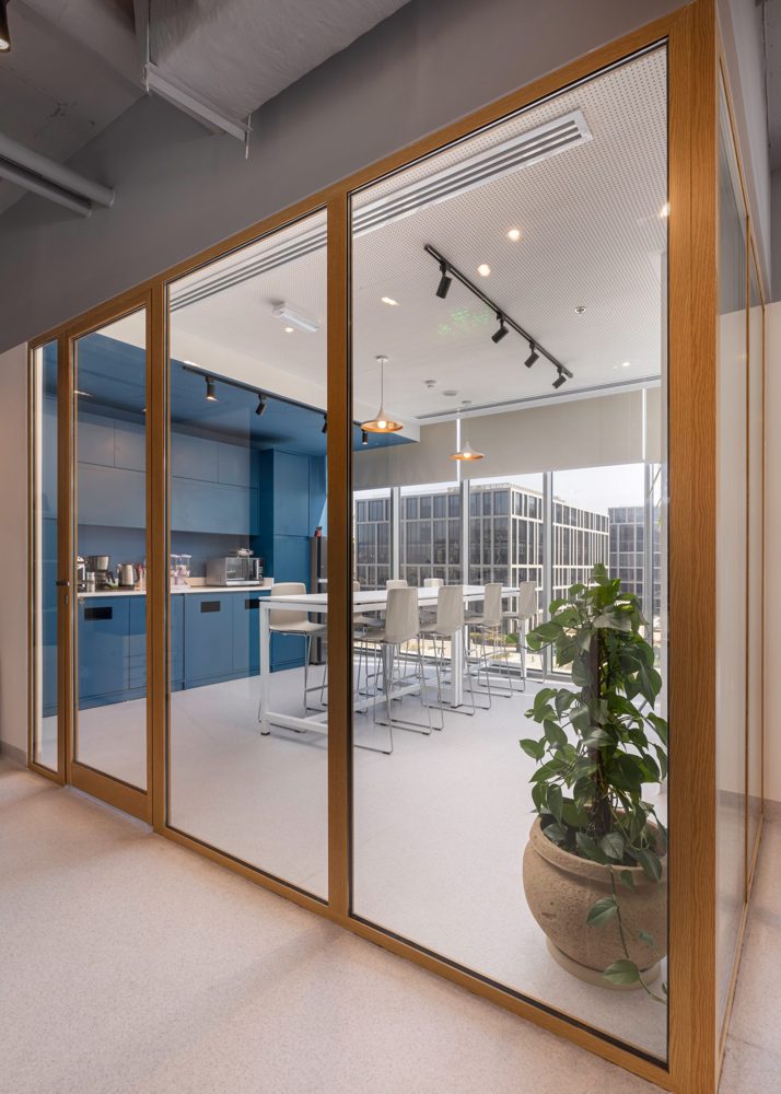 Bright commercial workspace with glass partitions